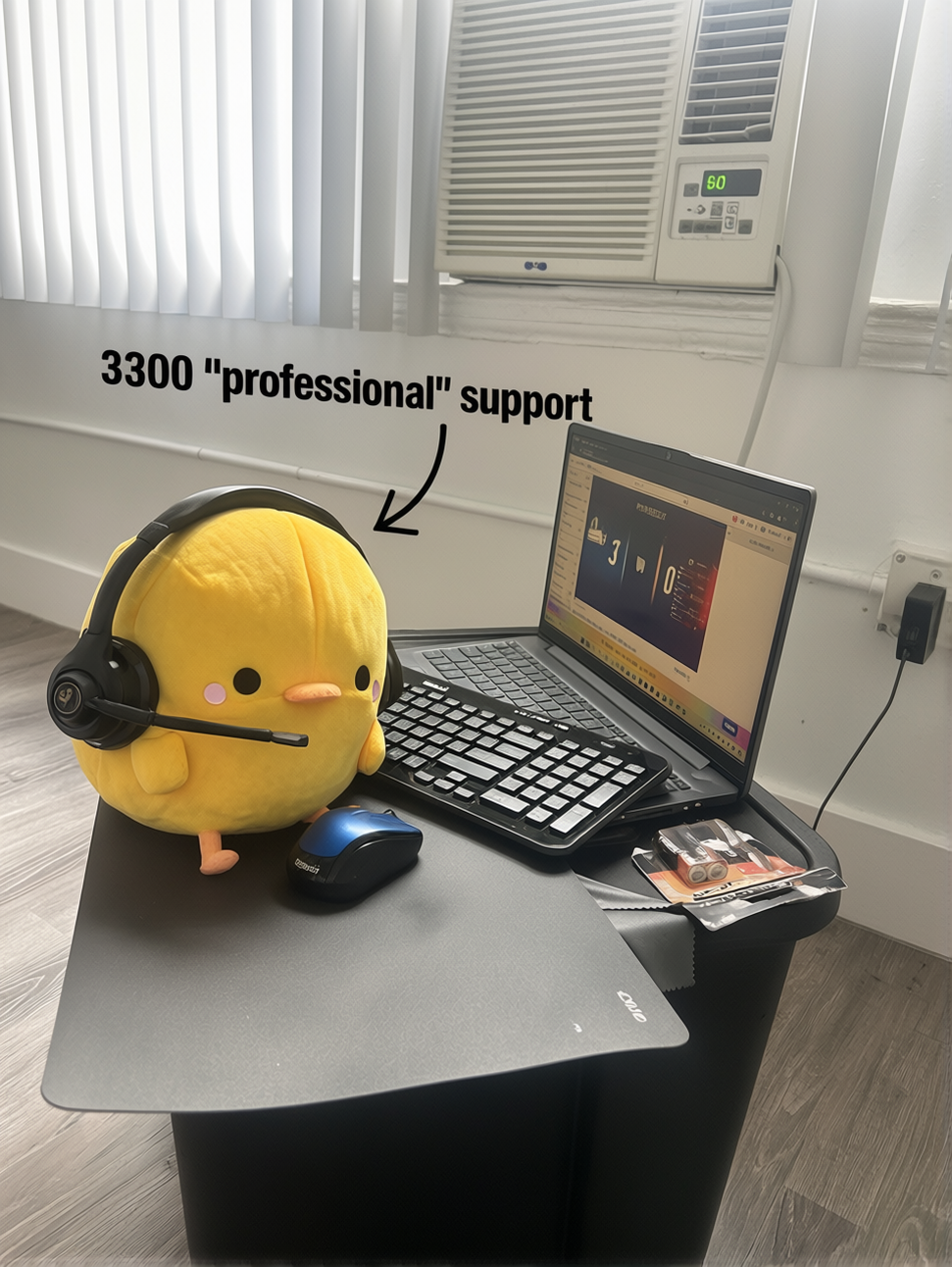 Henry plush wearing headphones beside a laptop, annotated as 3300 professional support